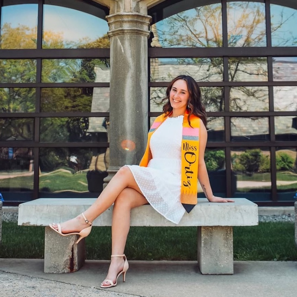 White Lace Dress with Yellow and Red Sash